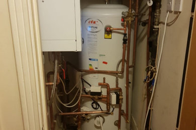 Change old vented to unvented with installation of system boiler