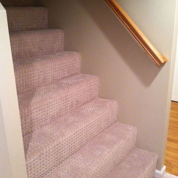 Completed stairway with berber carpeting