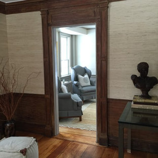 Inspiration för mellanstora eklektiska hemmabibliotek, med beige väggar, mellanmörkt trägolv, en standard öppen spis, en spiselkrans i gips och ett fristående skrivbord