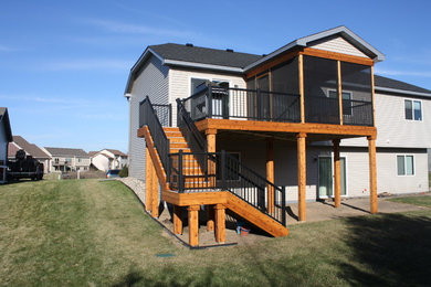 Deck - mid-sized traditional backyard deck idea in Minneapolis