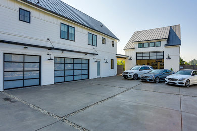 Design ideas for a large country attached three-car garage in Portland.