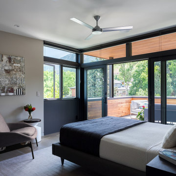 Floor to Ceiling Windows and Outdoor Patio Connected to Bedroom