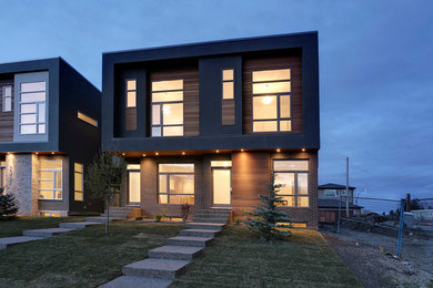 Example of a trendy exterior home design in Calgary