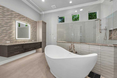 Bathroom - large contemporary master gray tile and porcelain tile porcelain tile, beige floor and single-sink bathroom idea in Miami with shaker cabinets, dark wood cabinets, a two-piece toilet, gray walls, an undermount sink, quartz countertops, multicolored countertops, a niche and a floating vanity
