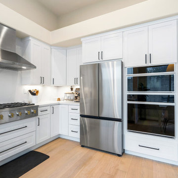 Sleek Modern Kitchen with White Cabinets 2 and High-End Appliances