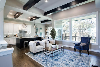 Inspiration for a mid-sized transitional open concept medium tone wood floor living room remodel in Wichita with gray walls