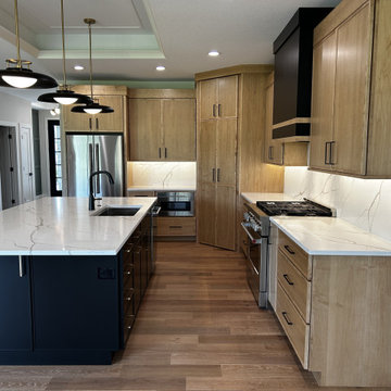 Maple Pecan Stain and Painted Black Kitchen Design in Bettendorf, Iowa