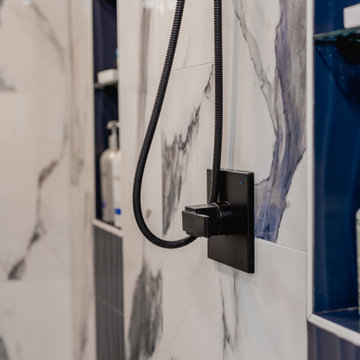 Bathroom remodeling in Columbia, MD with double vanity & marble bathtub
