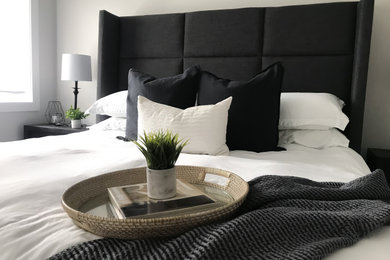 Inspiration for a contemporary master light wood floor bedroom remodel in Toronto with gray walls