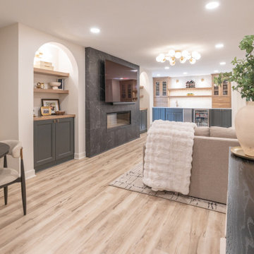 Warm & Inviting Basement Retreat with Custom Bar + Entertainment Center