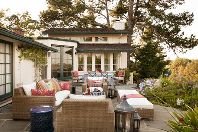 Example of a mid-sized classic backyard stone patio design in San Francisco