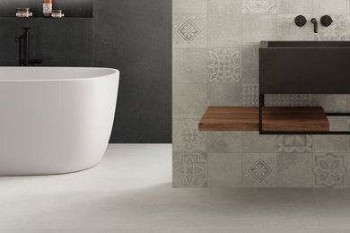 Design ideas for a modern family bathroom in London with flat-panel cabinets, black cabinets, a freestanding bath, grey tiles, porcelain tiles, black walls, porcelain flooring, a built-in sink, wooden worktops, white floors, brown worktops, a single sink and a floating vanity unit.