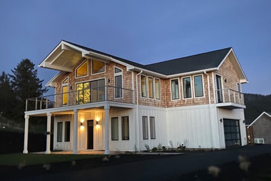 Example of a country exterior home design in Portland