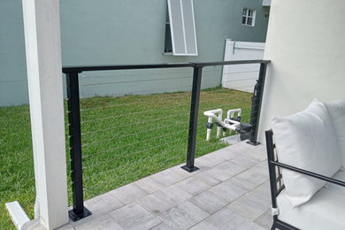 This is an example of a contemporary veranda in Tampa.