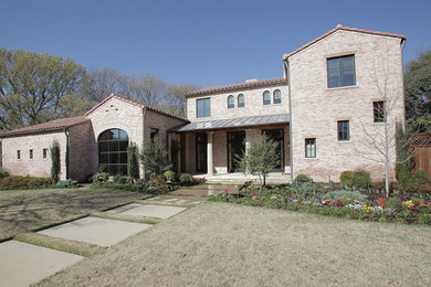 Tuscan exterior home photo in Dallas