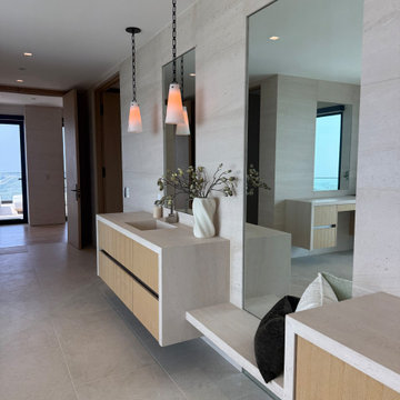 Oceanfront Limestone Spa Bathroom with Slab Walls - Malibu