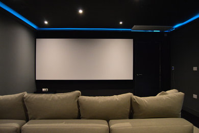 Medium sized modern home cinema in London.