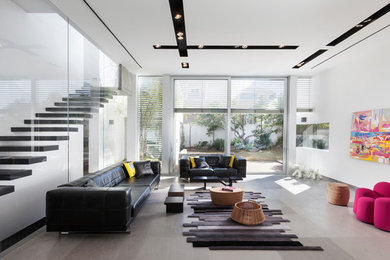 Inspiration for a huge modern formal and loft-style ceramic tile and gray floor living room remodel in Tel Aviv with white walls and no fireplace