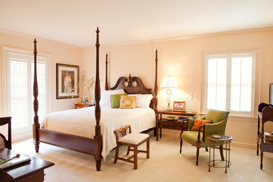 Bedroom - large traditional carpeted bedroom idea in Charlotte with beige walls and no fireplace