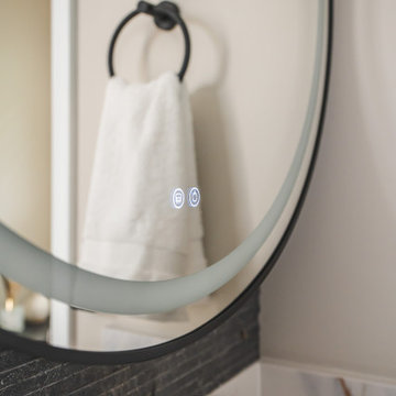 Bathroom Remodel in Sterling, VA Tub, glass shower, double vanity, stone wall