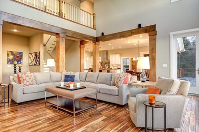 Living room - large rustic open concept medium tone wood floor living room idea in Other with beige walls, a standard fireplace, a brick fireplace and a wall-mounted tv