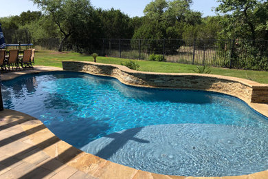 Inspiration for a tropical pool remodel in Austin