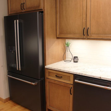 Maple Kitchen With Black and Gold Accents