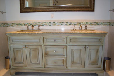 Example of a classic powder room design in New York