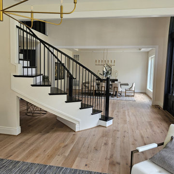 Project #130 | Curved Staircase with Wraparound Balcony