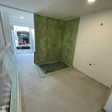 transformation d'un garage en salle de bain avec les normes PMR