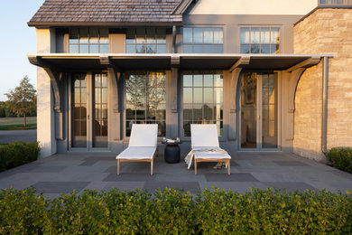 Patio - transitional patio idea in Other