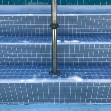 These pool steps just got a much needed makeover from the Anderson team!