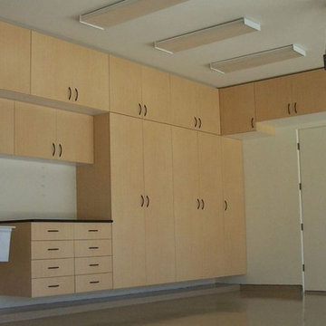 Garages Cabinets, Epoxy Flooring, Tile Flooring & Slatwall and Accessories