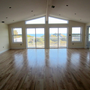 MONTAUK NEW CONSTRUCTION: 3 1/4" #1 RED OAK INSTALLED AND FINISHED NATURAL!