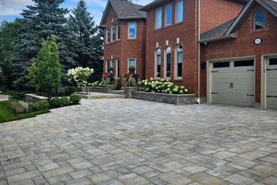 Inspiration for a transitional exterior home remodel in Toronto