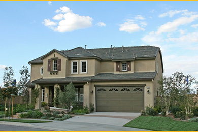 Design ideas for a small traditional partial sun front yard stone landscaping in Toronto.