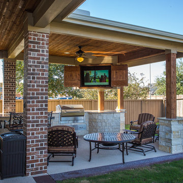 Uniquely Beautiful Covered Patio with a Fire Table