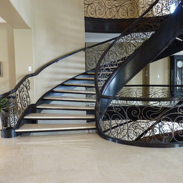 Curved Stair With Metal Pickets