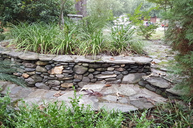 Design ideas for a large traditional partial sun side yard stone garden path in Atlanta.
