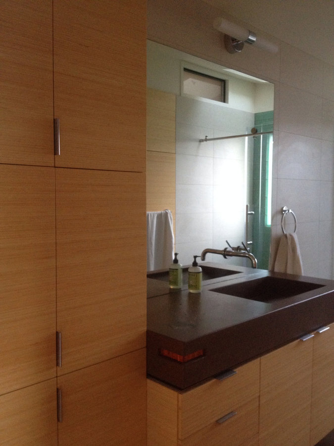 Concrete vanity top and bamboo cabinets