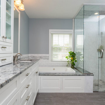 Contemporary Primary Spa Bath With Kohler Archer BubbleMassage Air Bath Tub