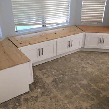 Kitchen white shaker upper cabinets and dark grey shaker base cabinets