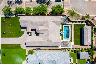 Example of a large trendy backyard rectangular hot tub design in Phoenix