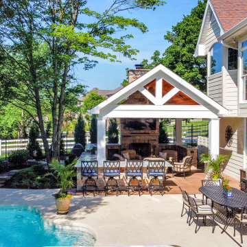 Pool Side Covered Patio with Fireplace and Bar Area