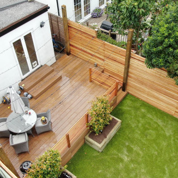 Millboard deck, artificial grass and cedar slat fencing in Reigate