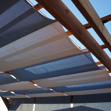 Infintiy Canopy in D. Poolside and White installed on to a custom Ceader Pergola