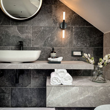 Luxurious Loft Bathroom with Freestanding Tub and Skylight Design