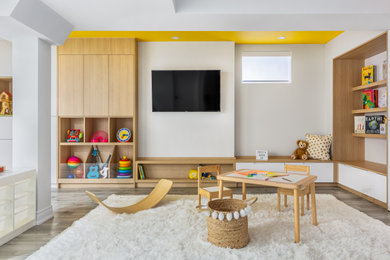 Large minimalist vinyl floor, gray floor and wallpaper playroom photo in Toronto with multicolored walls