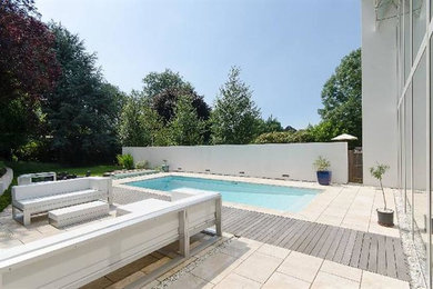 Photo of a contemporary swimming pool in Other.