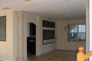 Example of a minimalist dining room design in Other